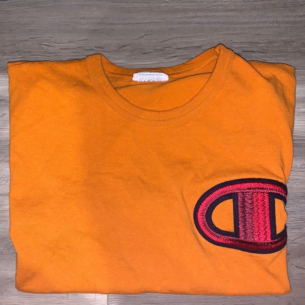 Champion Tee